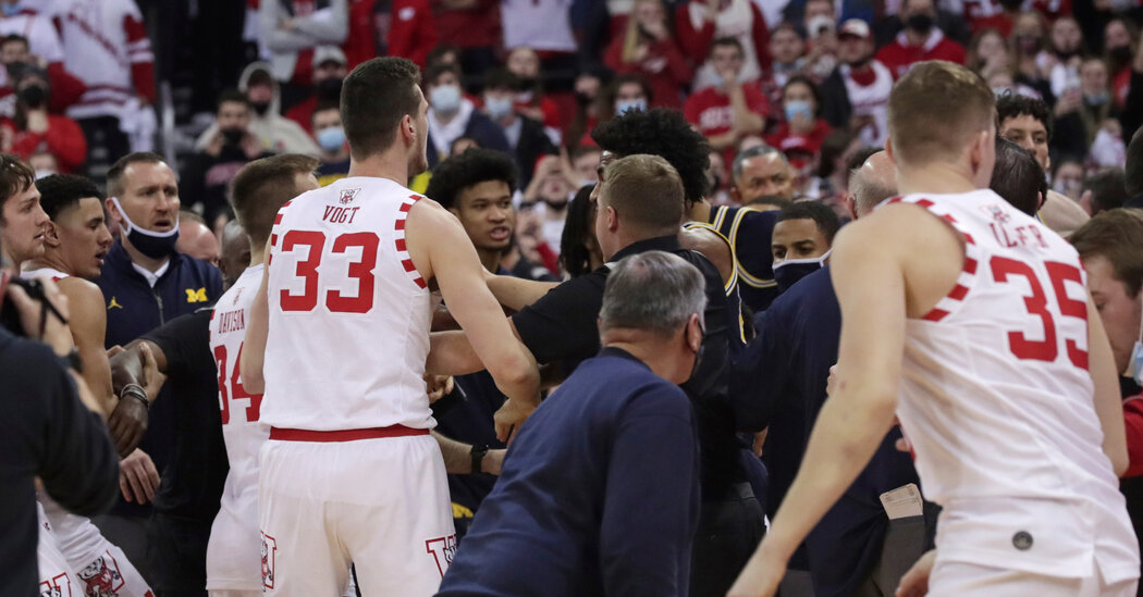 Juwan Howard Slaps Rival Coach After Michigan-Wisconsin Game