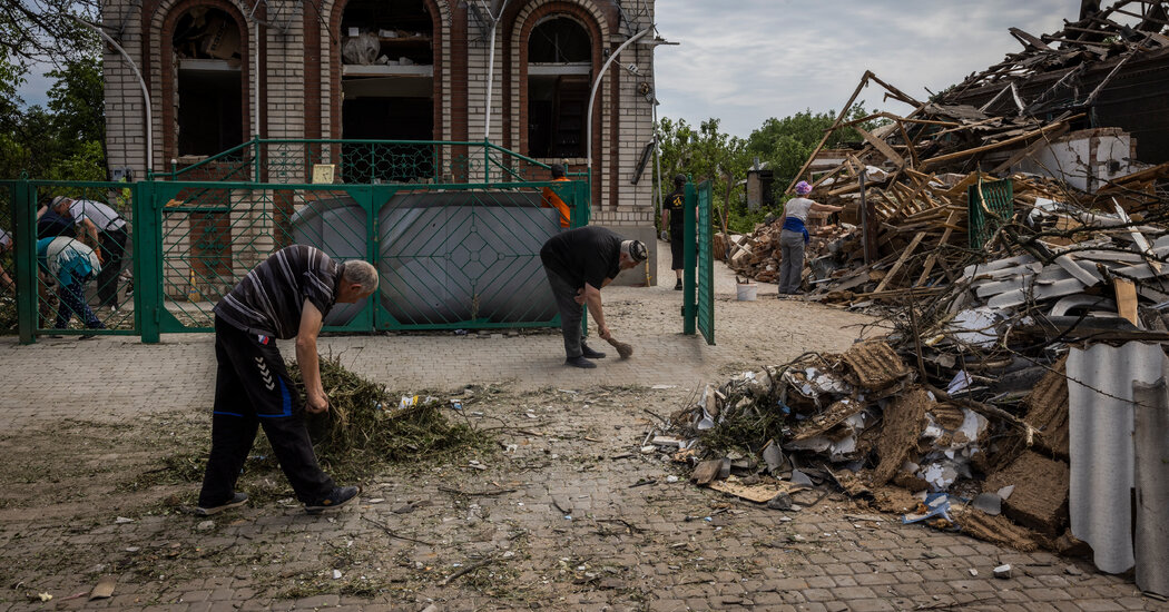 Ukraine Live Updates: Russian Missiles Hit Kyiv, as Putin Issues Warning to the West