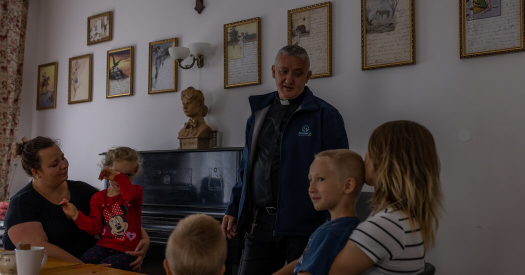 A Polish Priest’s War Against Abortion Focuses on Helping Single Mothers